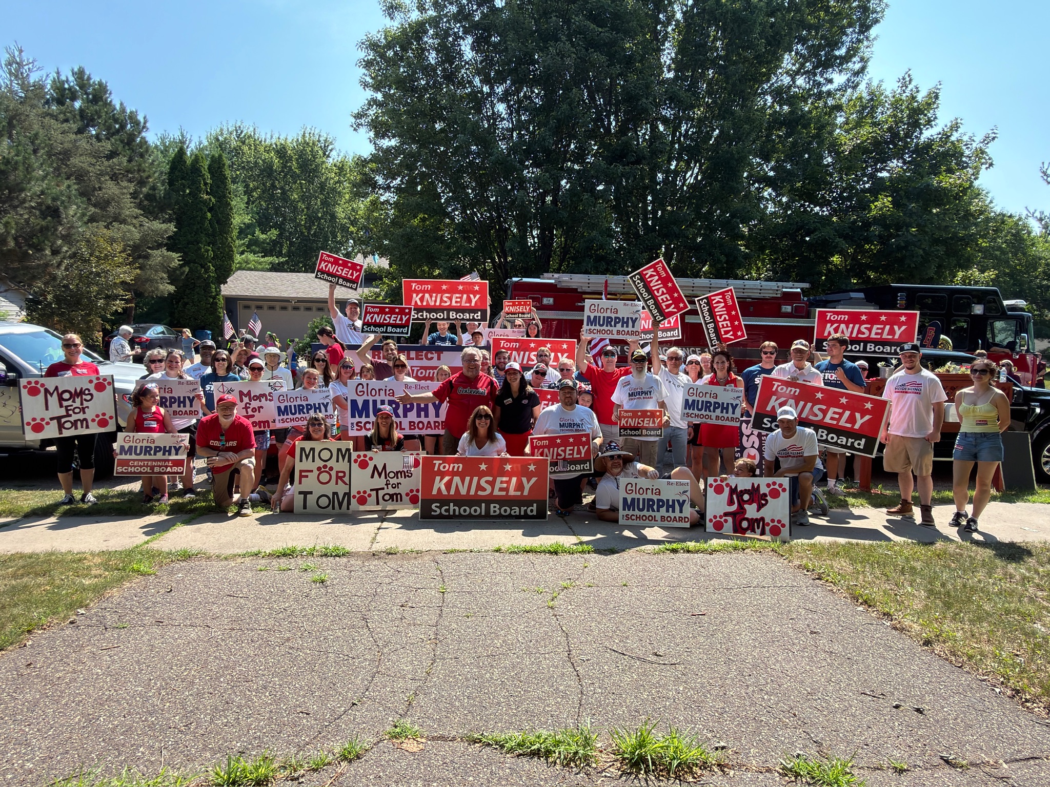 Centennial community members gathered with campaign signs