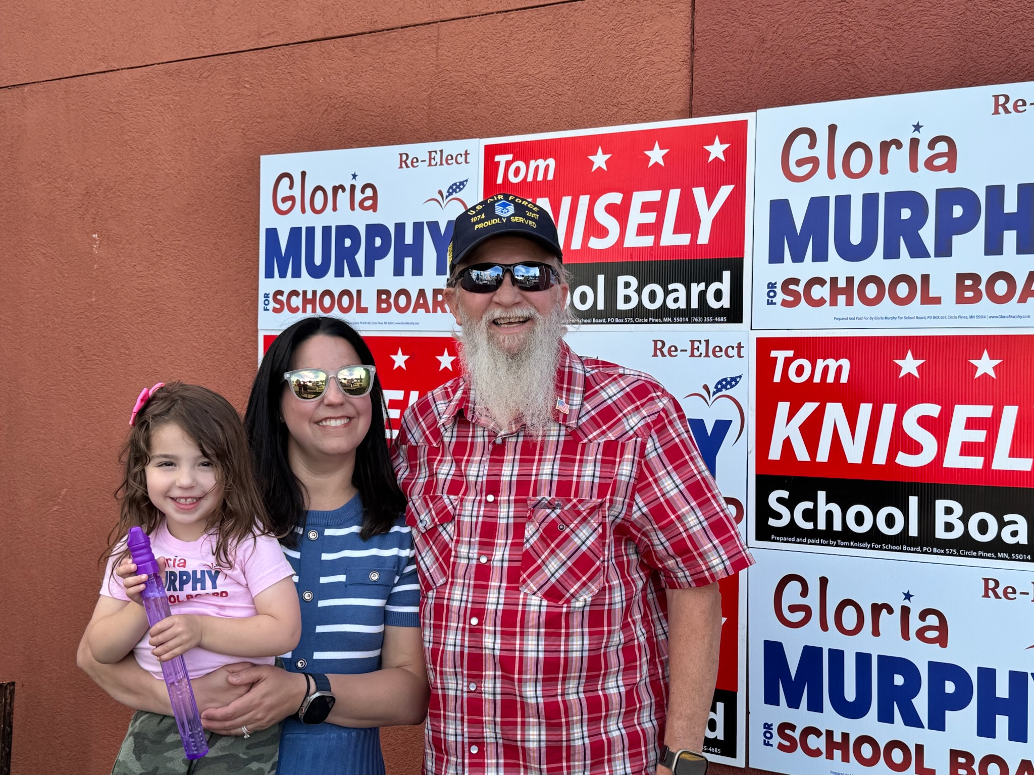 Gloria with her daughter and community supporters